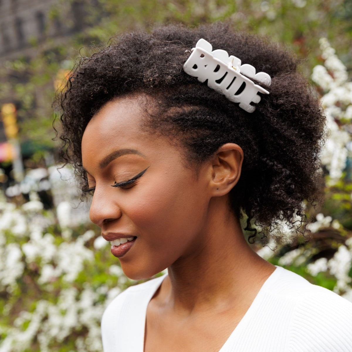 Young woman wearing BRIDE patented hair claw clip made by FiZZY for women