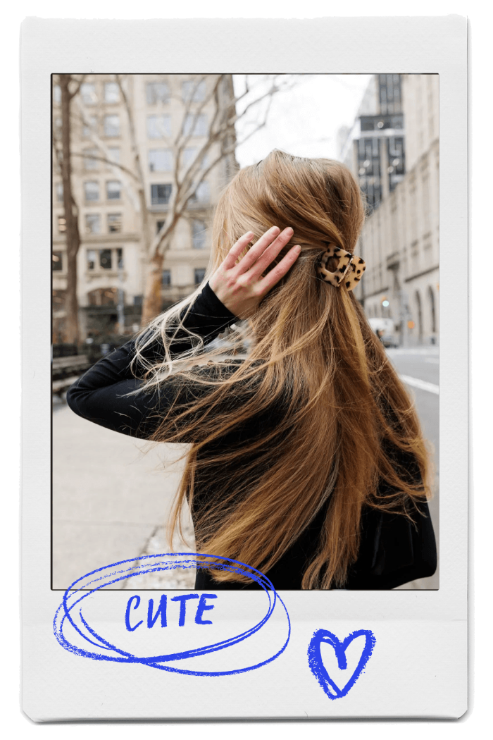 Young woman wearing OG 2x2 tortoise shell hair claw clip by FiZZY