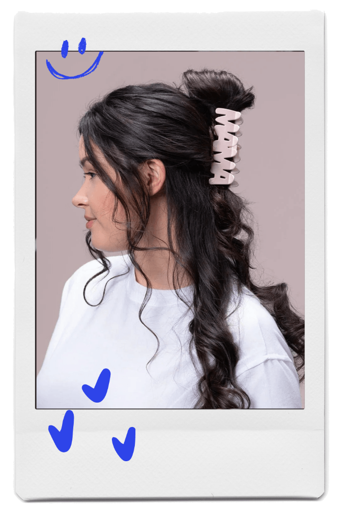 Young woman wearing MAMA word hair claw clip by FiZZY in dark brunette black hair