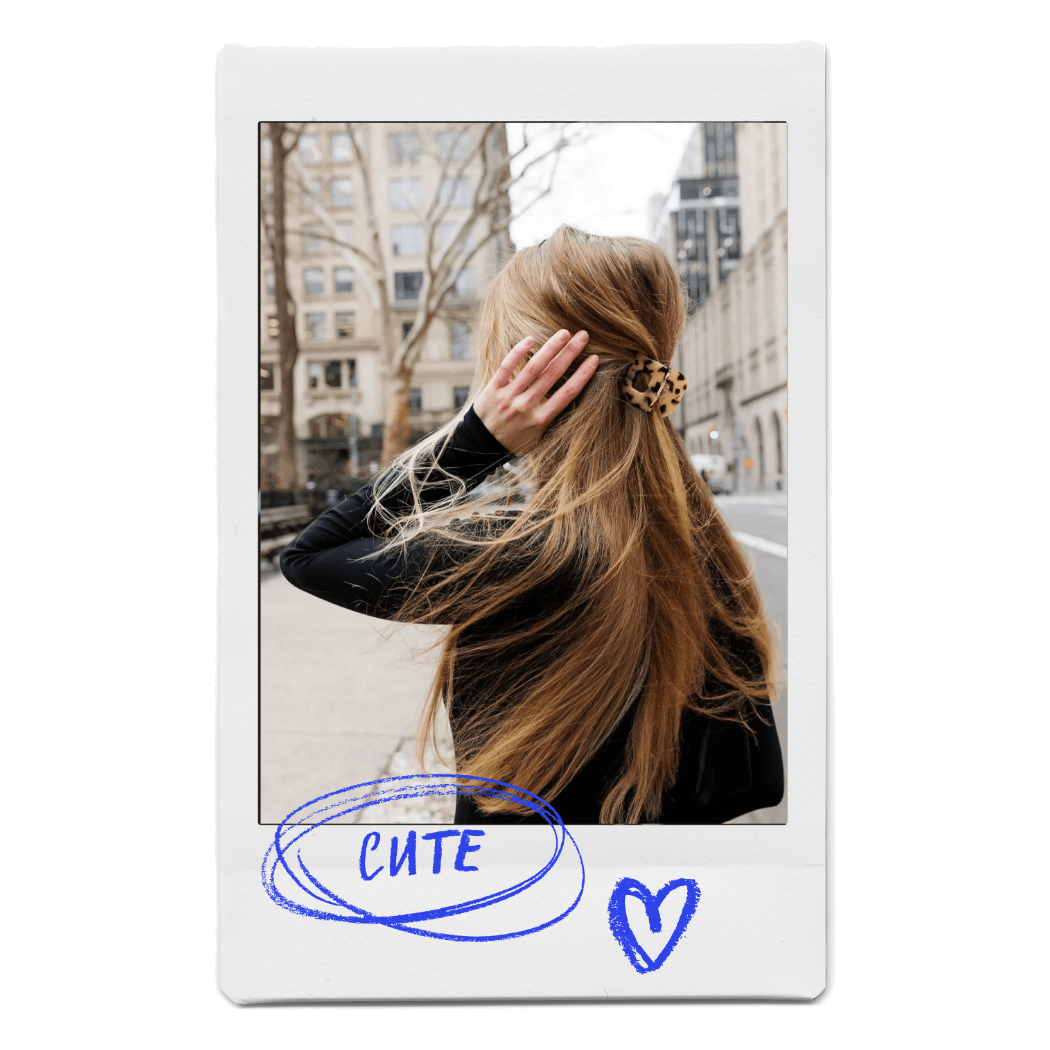 Young blonde woman wearing original hair claw for women made by FiZZY