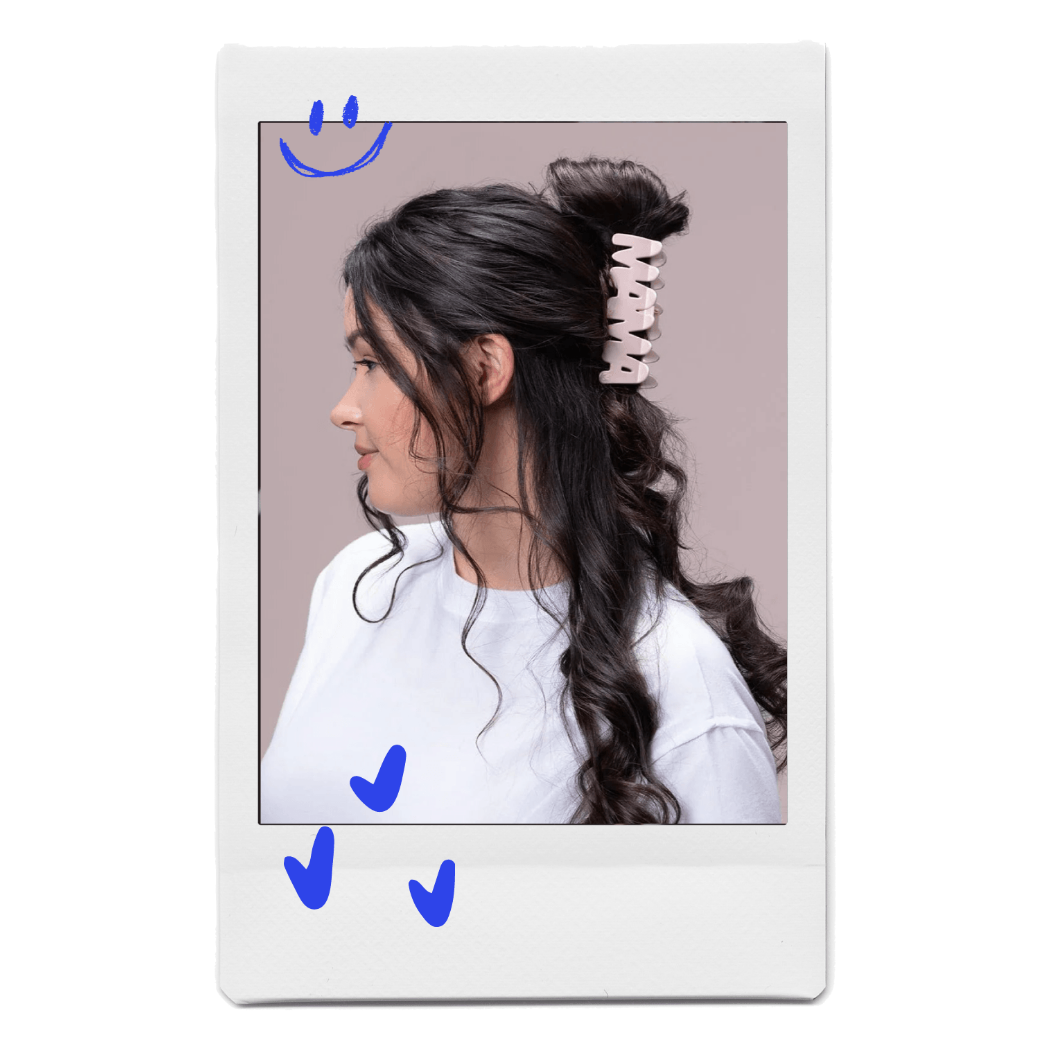 Young brunette woman wearing MAMA patented word hair claw clip by FiZZY