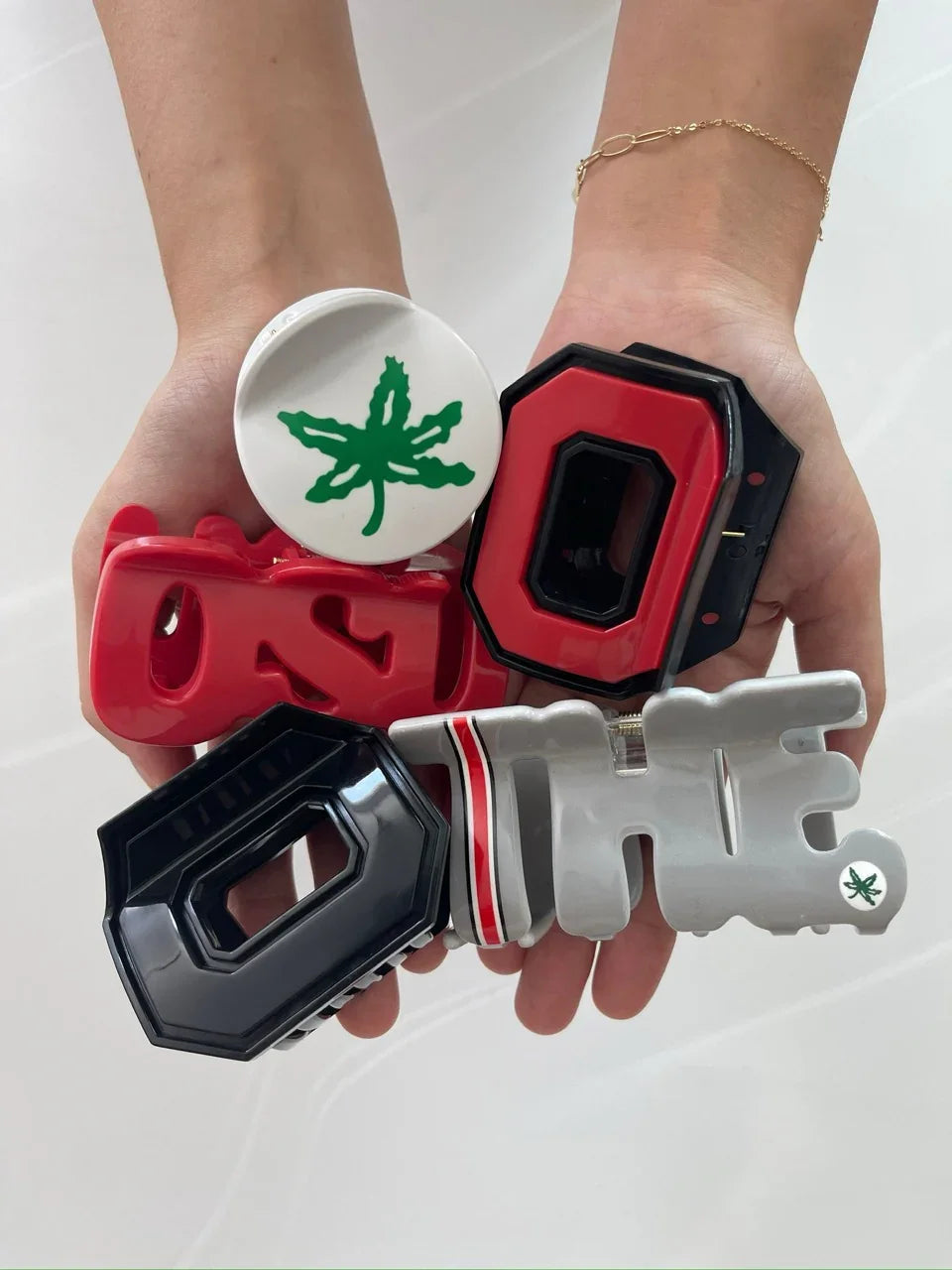 OSU hair clips by FiZZY in a variety of collegiate claw clip styles